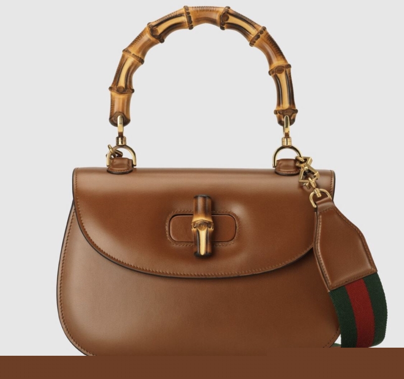 G*u*i top handle bags